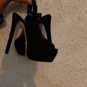 Bebe black net heels